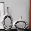 Silver Orbit Vase Collection